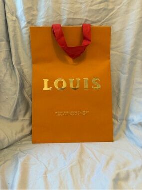 Louis Vuitton limited holiday shopping bag with Red Handles and Gold Lettering